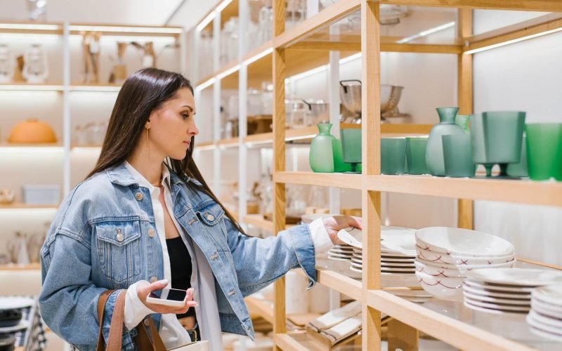 young-woman-chooses-crockery-in-a-home-improvement-shop.jpg